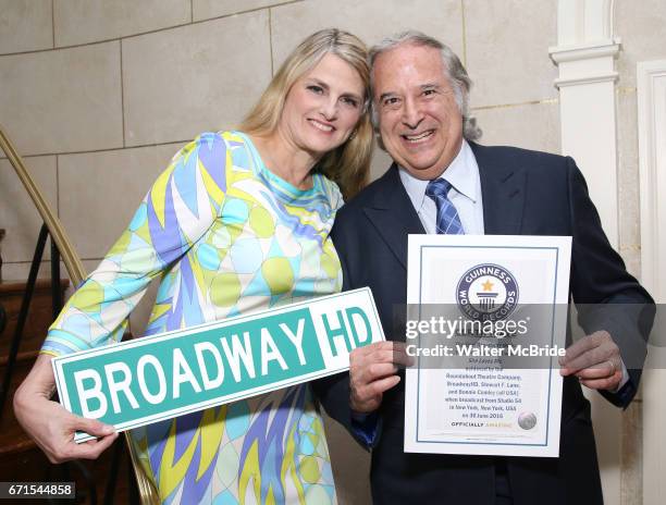 Stewart F. Lane and Bonnie Comley pose with Guinness World Records Certificate Achieved By BroadwayHD for the First Broadway Show, 'She Loves Me', to...