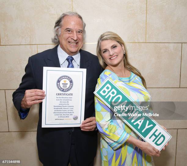 Stewart F. Lane and Bonnie Comley pose with Guinness World Records Certificate Achieved By BroadwayHD for the First Broadway Show, 'She Loves Me', to...