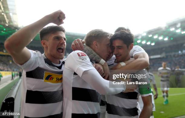 Oscar Wendt of Moenchengladbach celebrates with Jonas Hofmann of Moenchengladbach, Lars Stindl of Moenchengladbach and Ibrahima Traore of...