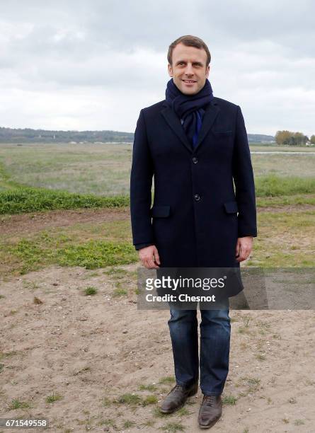 Head of the political movement En Marche! and candidate for the 2017 presidential election, Emmanuel Macron poses for the photograph on April 22,...