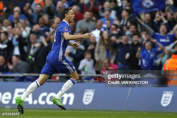 Chelsea's Serbian midfielder Nemanja Matic celebrates after scoring their fourth goal during the FA Cup semi-final football match between Tottenham...