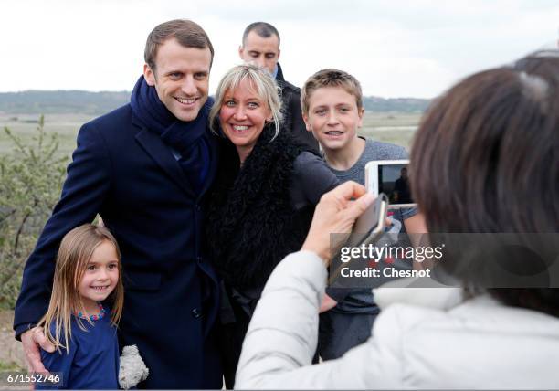 Emmanuel Macron, head of the political movement En Marche! and candidate for the 2017 presidential election poses with residents of Le Touquet on...