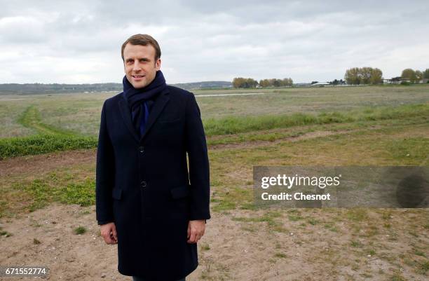 Head of the political movement En Marche! and candidate for the 2017 presidential election, Emmanuel Macron poses for the photograph on April 22,...