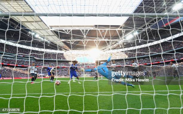 Eden Hazard of Chelsea scores his sides third goal as Hugo Lloris of Tottenham Hotspur attempts to save during The Emirates FA Cup Semi-Final between...