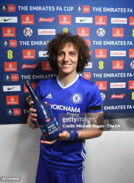 David Luiz of Chelsea poses with the Man of The Match Award following The Emirates FA Cup Semi-Final between Chelsea and Tottenham Hotspur at Wembley...