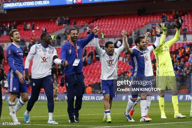 Chelsea celebrate victory after the FA Cup semi-final football match between Tottenham Hotspur and Chelsea at Wembley stadium in London on April 22,...