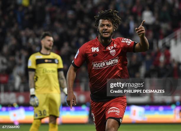 Dijon's French forward Lois Diony celebrates after scoring during the French L1 football match between Dijon FCO and Angers SCO on April 22, 2017 at...