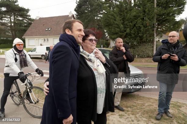 Candidate for the 2017 presidential election, Emmanuel Macron and head of the political movement En Marche! poses with residents on April 22, 2017 in...