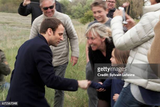 Candidate for the 2017 presidential election, Emmanuel Macron and head of the political movement En Marche! poses with residents on April 22, 2017 in...