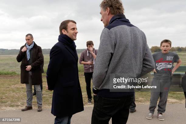 Candidate for the 2017 presidential election, Emmanuel Macron and head of the political movement En Marche! discusses with his supporters on April...