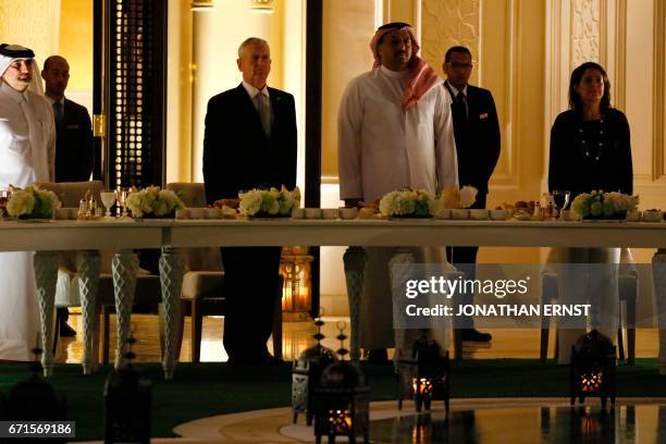 Qatar Minister of State for Defense Affairs Khalid bin Mohammed al-Attiyah sits with US Defence Secretary James Mattis for dinner at his residence in...