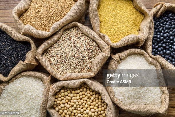 varieties of grains seeds and raw quino - rice stock pictures, royalty-free photos & images