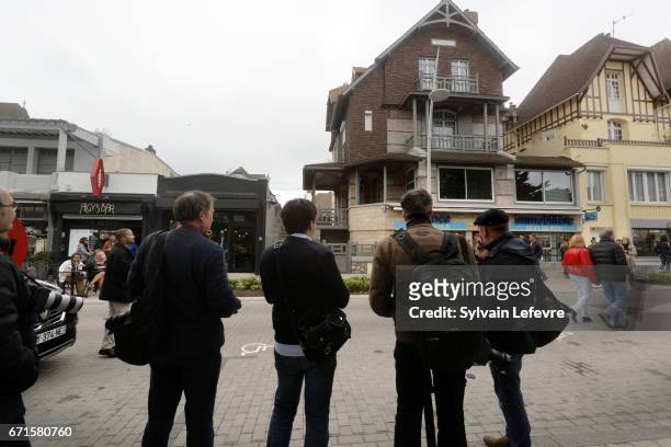 Photographers are seen in front of the Macron home in Le Touquet on April 22, 2017 in Le Touquet-Paris-Plage, France.