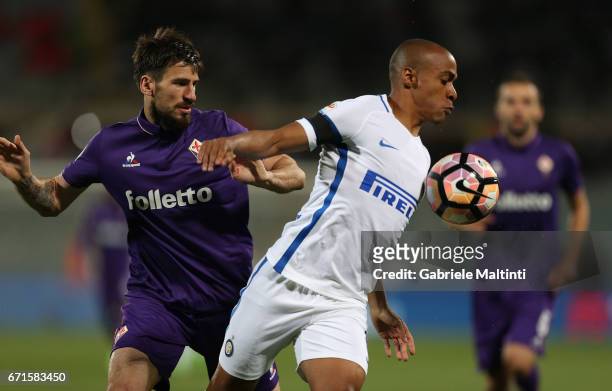Nenad Tomovic of ACF Fiorentina battles for the ball with Joao Mario of FC Internazionale during the Serie A match between ACF Fiorentina v FC...