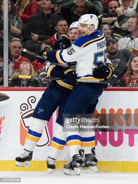 Alexander Steen and Colton Parayko of the St. Louis Blues celebrate a goal against the Minnesota Wild by Steen during the first period in Game Five...