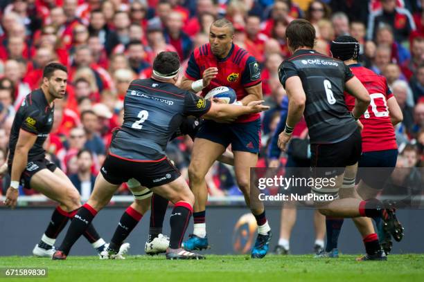 Simon Zebo of Munster tackled by Jamie George of Saracens during the European Rugby Champions Cup Semi-Final match between Munster Rugby and Saracens...