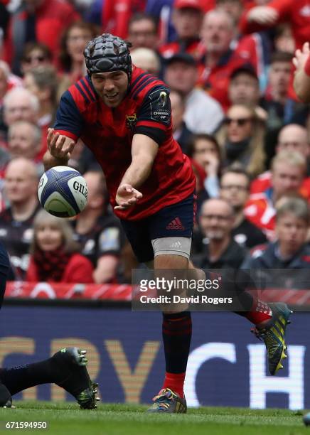 Duncan Williams of Munster passes the ball during the European Rugby Champions Cup semi final match between Munster and Saracens at the Aviva Stadium...