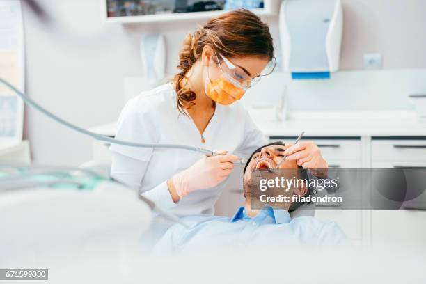 dental cavity removal - dentista imagens e fotografias de stock
