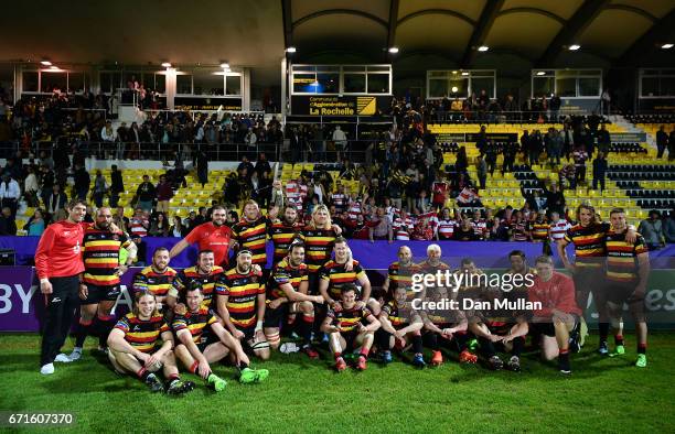 The Gloucester players pose for a picture with their fans following victory during the European Rugby Challenge Cup Semi Final match between La...