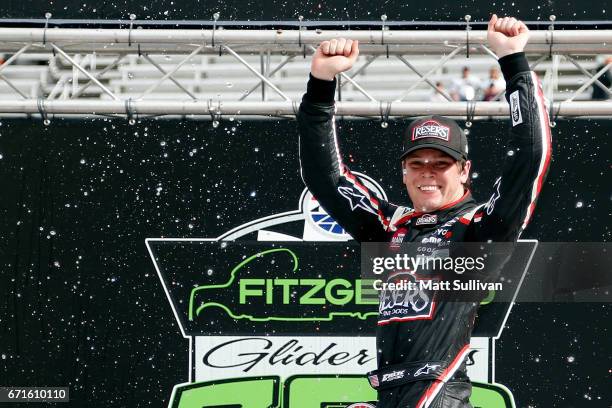 Erik Jones, driver of the Reser's American Classic Toyota, celebrates in Victory Lane after winning the NASCAR XFINITY Series Fitzgerald Glider Kits...