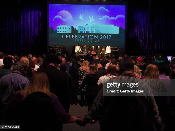 In this handout provided by Paisley Park Studios, A minute of silence in the Paisley Park Soundstage with family members Alfred Jackson, Joel...