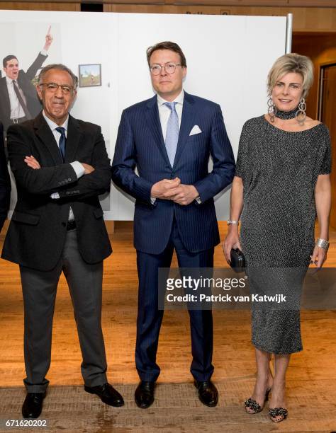 Prince Constantijn of The Netherlands and Princess Laurentien of The Netherlands with Turkish AP photographer Burhan Ozbilici pose with the World...