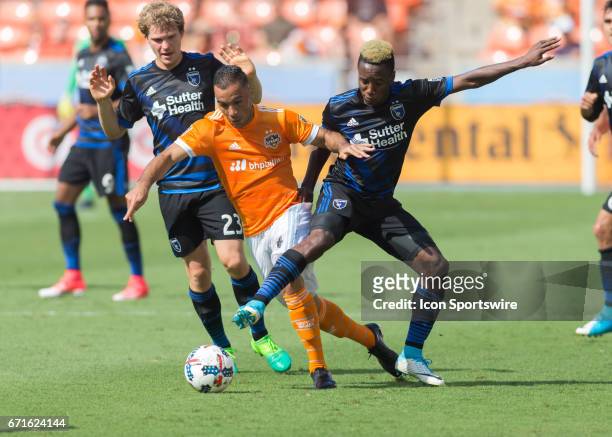 Houston Dynamo midfielder Alex and San Jose Earthquakes forward Marco Urena fight for ball during the MLS match between San Jose Earthquakes and...