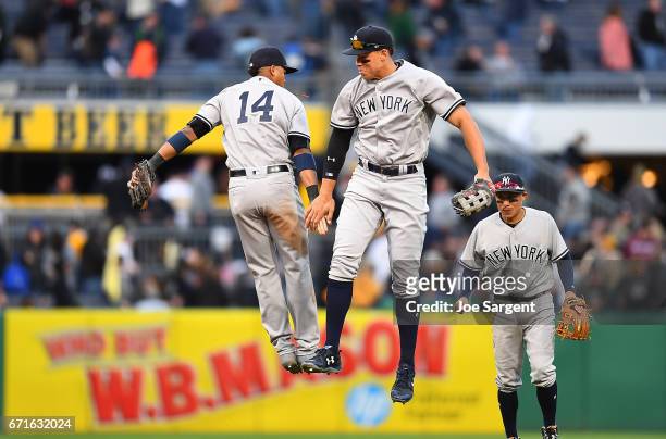 Aaron Judge celebrates with Starlin Castro of the New York Yankees after a 11-5 win over the Pittsburgh Pirates at PNC Park on April 22, 2017 in...