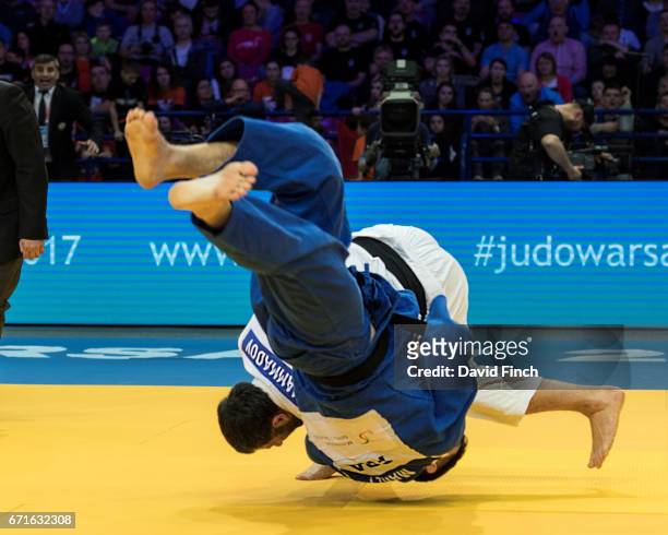 Elkhan Mammadov of Azerbaijan throws Cyrille Maret of France for an ippon to win the u100kg gold medal during the 2017 Warsaw European Judo...