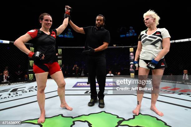 Alexis Davis celebrates after defeating Cindy Dandois of Belgium in their women's bantamweight bout during the UFC Fight Night event at Bridgestone...