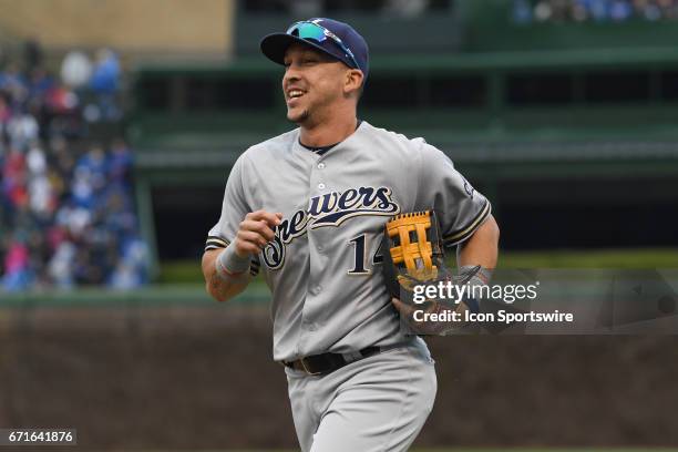 Milwaukee Brewers third baseman Hernan Perez smiles while jogging back to the dguout during a game between the Milwaukee Brewers and the Chicago Cubs...