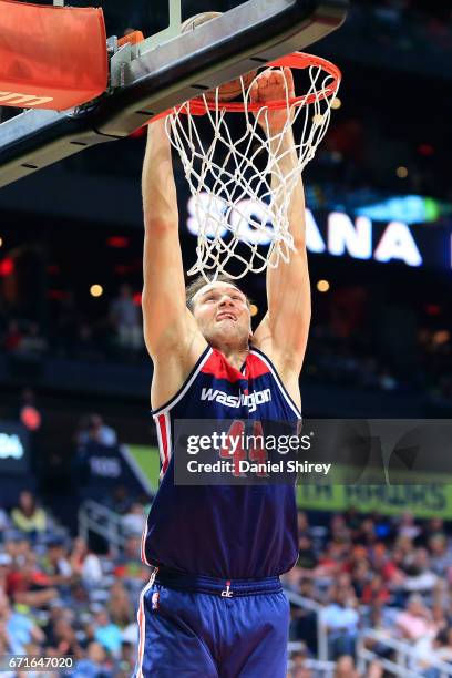 Bojan Bogdanovic of the Washington Wizards dunks during the fourth quarter against the Atlanta Hawks in Game Three of the Eastern Conference...