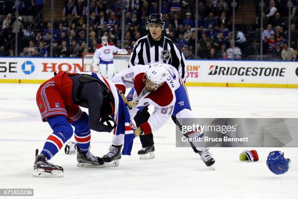 Jimmy Vesey of the New York Rangers fights with Max Pacioretty of the Montreal Canadiens during the first period in Game Six of the Eastern...