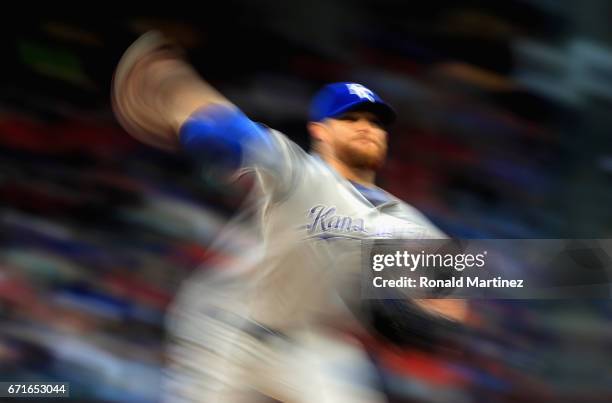 Ian Kennedy of the Kansas City Royals throws against the Texas Rangers in the second inning at Globe Life Park in Arlington on April 22, 2017 in...