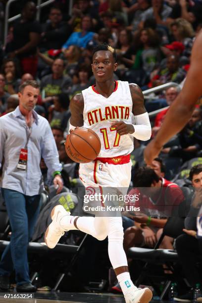 Dennis Schroder of the Atlanta Hawks handles the ball against the Washington Wizards in Game Three of the Eastern Conference Quarterfinals during the...