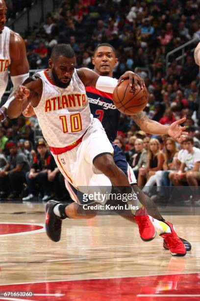 Tim Hardaway Jr. #10 of the Atlanta Hawks drives to the basket against the Washington Wizards in Game Three of the Eastern Conference Quarterfinals...