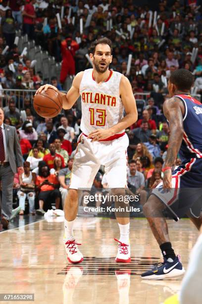 Jose Calderon of the Atlanta Hawks handles the ball against the Washington Wizards in Game Three of the Eastern Conference Quarterfinals during the...