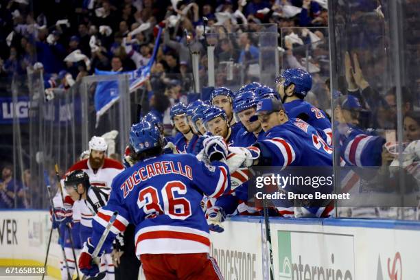 Mats Zuccarello of the New York Rangers celebrates with his teammates after scoring a goal against the Montreal Canadiens during the second period in...