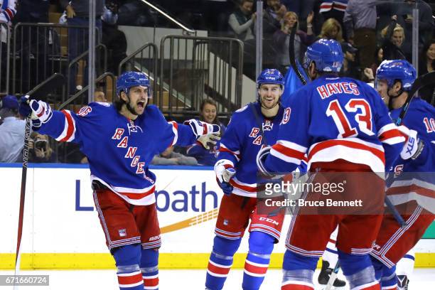 Mats Zuccarello of the New York Rangers celebrates scoring his second goal against Carey Price of the Montreal Canadiens during the second period in...