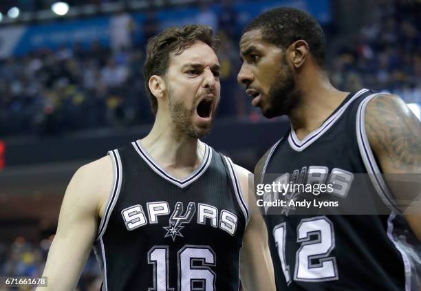 Pau Gasol of the San Antonio Spurs celebrates with LaMarcus Aldridge against the Memphis Grizzlies in game four of the Western Conference...
