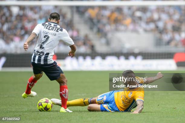 Ismael Sosa of Tigres fights for the ball with Edgar Castillo of Monterrey during the 15th round match between Monterrey and Tigres UANL as part of...