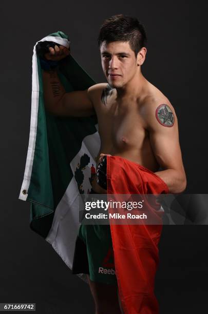Brandon Moreno of Mexico poses for a portrait backstage after his victory over Dustin Ortiz during the UFC Fight Night event at Bridgestone Arena on...