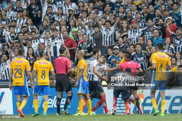 Jurgen Damm of Tigres argues with Edgar Castillo of Monterrey during the 15th round match between Monterrey and Tigres UANL as part of the Torneo...