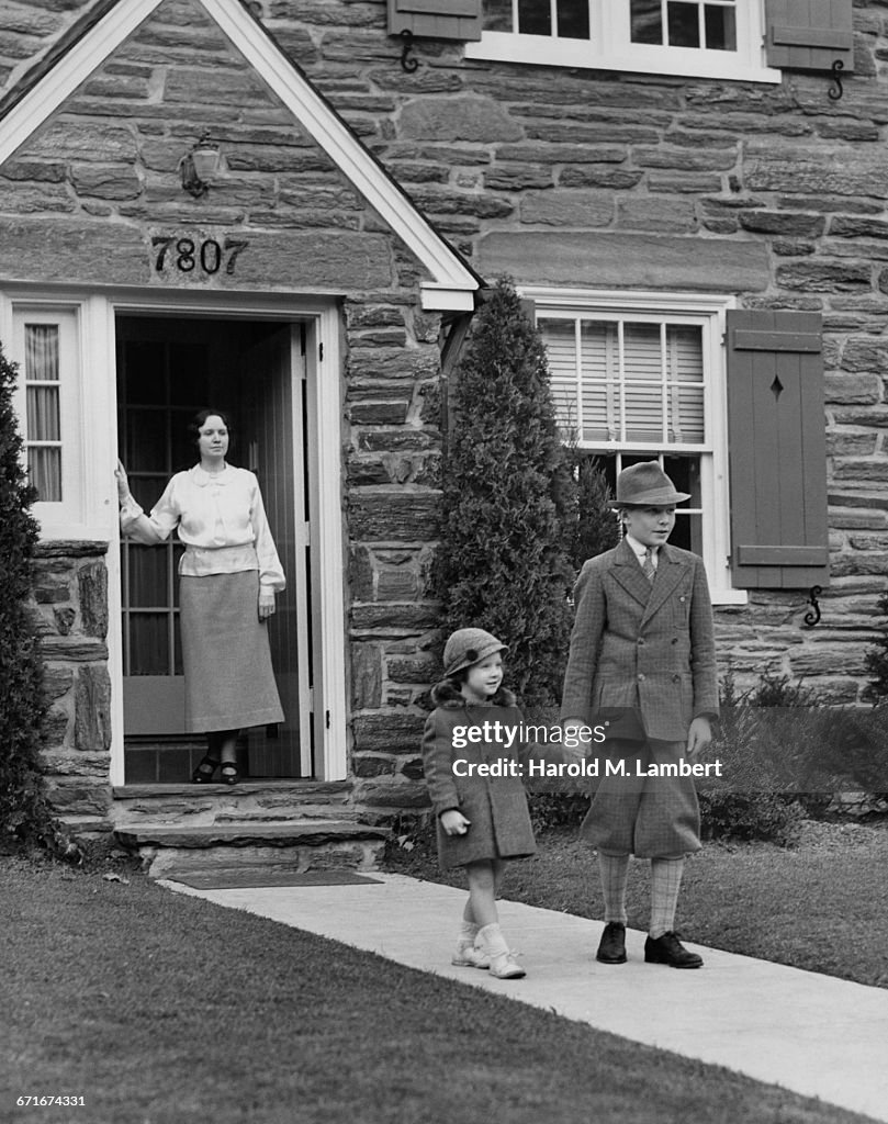  Son And Daughter Leaving From Home While Mother Looking At Them