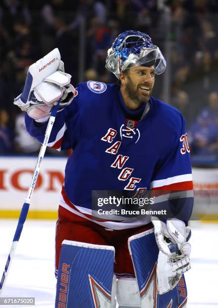 Henrik Lundqvist of the New York Rangers celebrates defeating the Montreal Canadiens in Game Six of the Eastern Conference to win the First Round...