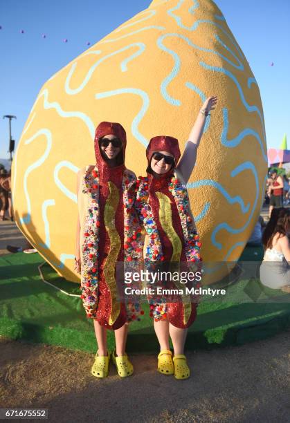 Festivalgoers dressed as sparkly hot dogs attend day 2 of the 2017 Coachella Valley Music & Arts Festival at the Empire Polo Club on April 22, 2017...