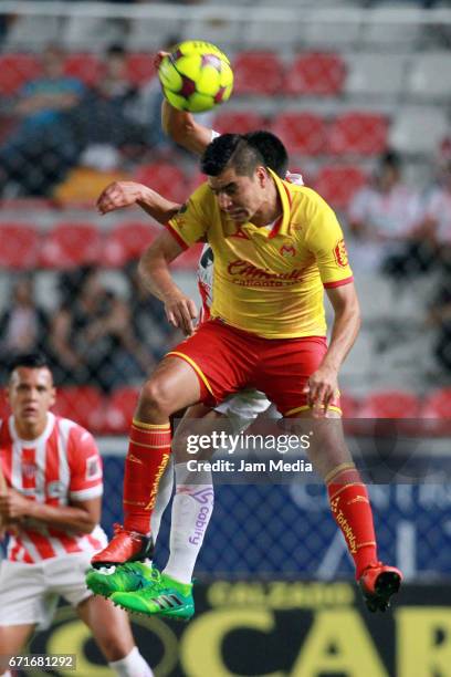 Enrique Perez of Morelia heads the ball during the 15th round match between Necaxa and Morelia as part of the Torneo Clausura 2017 Liga MX at...