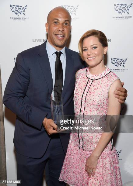 Honoree United States Senator Cory Booker, recipient of the Humanitarian of the Year award and actor Elizabeth Banks at The Humane Society of the...