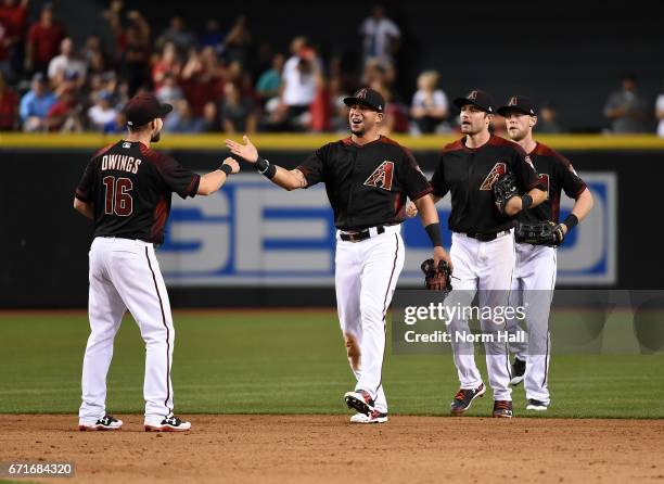 Chris Owings, David Peralta, AJ Pollock and Jeremy Hazelbaker of the Arizona Diamondbacks celebrate a 11-5 win against the Los Angeles Dodgers at...