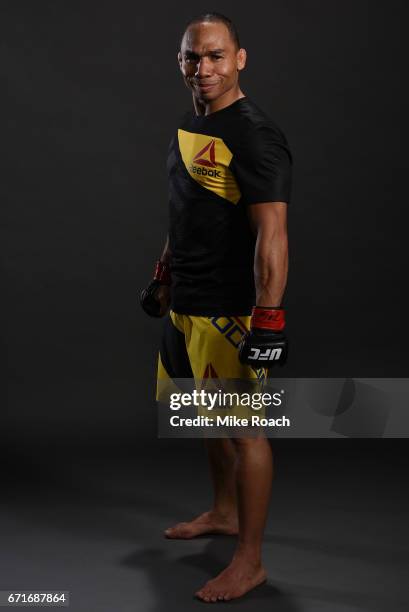 John Dodson poses for a portrait backstage after his victory over Eddie Wineland during the UFC Fight Night event at Bridgestone Arena on April 22,...